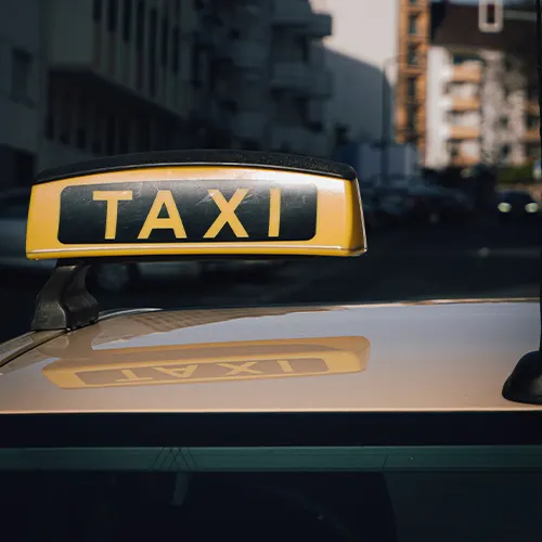 Close-up of an illuminated taxi roof sign